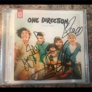 (SOLD) A one direction signed cd